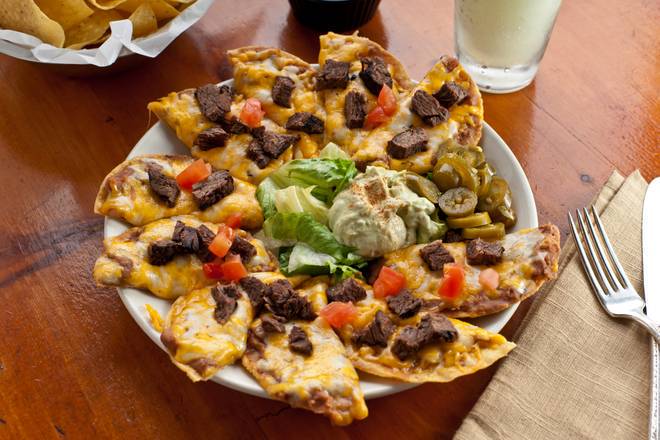 Order Fajita Nachos food online from El Chico store, Tulsa on bringmethat.com