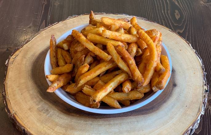 Order Cajun Fries food online from Holy Schnitzel store, Roseland on bringmethat.com