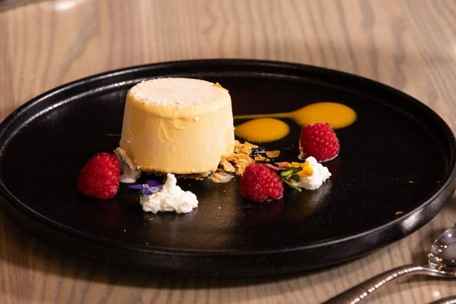 Order Mango Kulfi Mousse (GF) food online from Raag Indian Cuisine store, Minneapolis on bringmethat.com