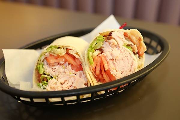 Order Turkey Club Wrap* food online from Mac Philly Steaks store, Rochester on bringmethat.com