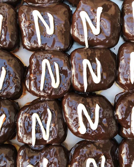 Order Dozen Dough Boy'sBest food online from Stan Donuts & Coffee store, Oak Brook on bringmethat.com