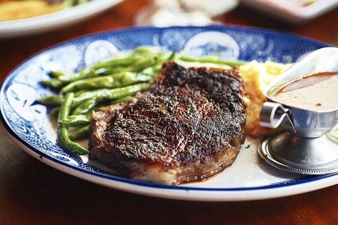 Order Ribeye 10 oz food online from Founding Farmers DC store, Washington on bringmethat.com