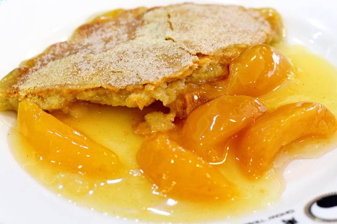 Order D1. Peach Cobbler food online from Captain King's Seafood City store, Memphis on bringmethat.com