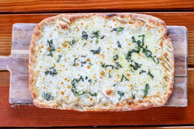 Order Cheesy Garlic food online from Tommy's Tavern + Tap store, Staten Island on bringmethat.com