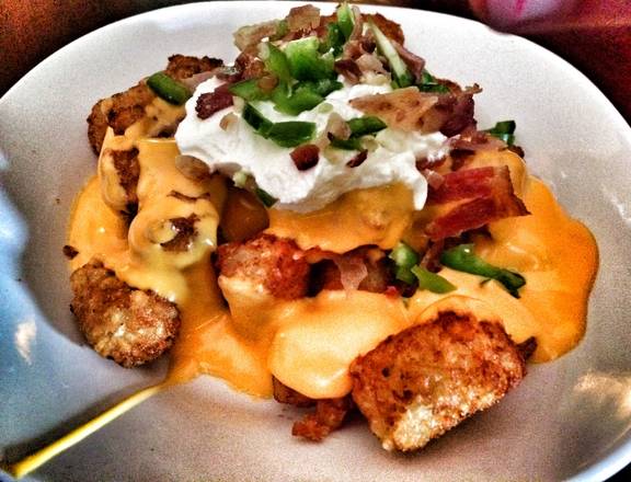 Order LOADED TATER TOTS food online from Whiskey Wings store, Largo on bringmethat.com