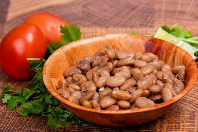 Order Side Beans food online from La Victoria Taqueria store, San Jose on bringmethat.com