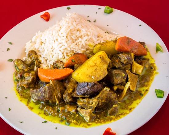 Order Curry Goat food online from Jerk Pit Tampa store, Tampa on bringmethat.com