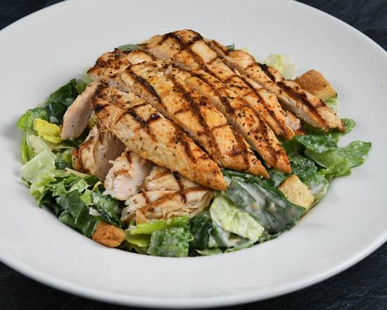 Order Big Islander Caesar Salad with Chicken food online from Rainforest Cafe - Galveston store, Galveston on bringmethat.com