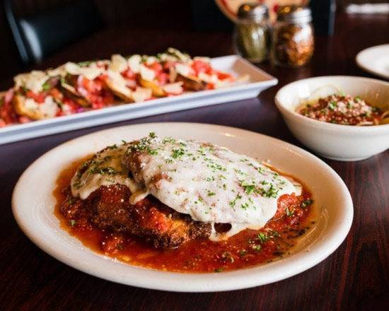 Order Chicken Parmigiana food online from Pizzavola store, West Melbourne on bringmethat.com