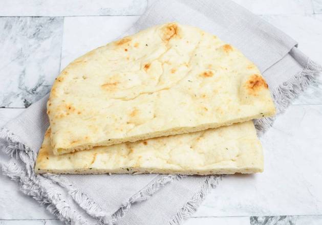 Order Garlic Naan by dosa by DOSA food online from Barzotto store, Palo Alto on bringmethat.com