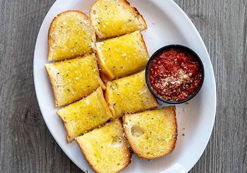 Order Garlic Bread with Marinara food online from Johnny's New York Style Pizza store, Sandy Springs on bringmethat.com