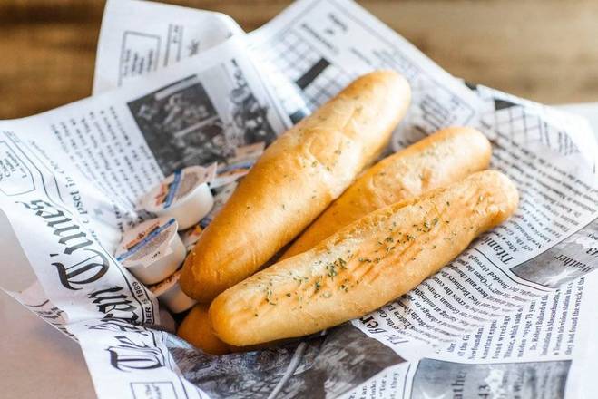 Order Garlic Breadsticks food online from Hook & Reel Cajun Seafood store, Killeen on bringmethat.com