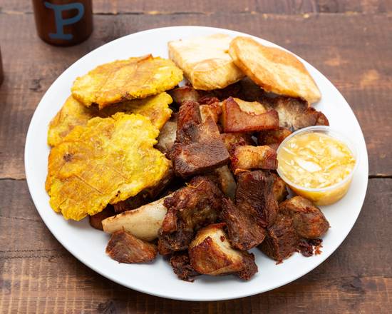 Order Griot (Fried Pork) food online from Paul's unique gourmet store, Miami on bringmethat.com