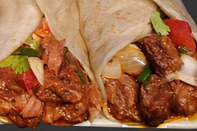 Order Carne guisada taco food online from Breakfast, Burgers & Tax-Mex Express store, Cedar Park on bringmethat.com