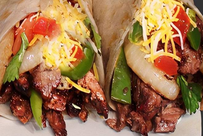 Order Beef fajitas taco food online from Breakfast, Burgers & Tax-Mex Express store, Cedar Park on bringmethat.com