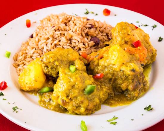 Order Curry Chicken food online from Jerk Pit Tampa store, Tampa on bringmethat.com