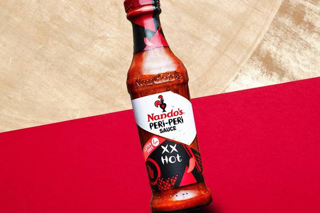 Order Bottle Sauce XX Hot food online from Nando's Peri-Peri store, College Park on bringmethat.com