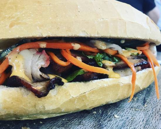 Order Lemongrass Pork Loin Banh Mi food online from EM Trai Sandwich Co store, Metairie on bringmethat.com