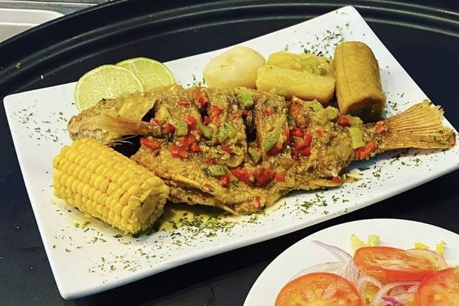 Order Fish Widower - Viudo de Pescado with 3 sides + 1 Coca Cola Gratis food online from Medellin Restaurant store, Coconut Creek on bringmethat.com