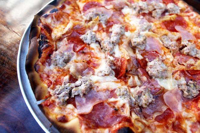 Order Carnivoro food online from Pizza Man store, Milwaukee on bringmethat.com