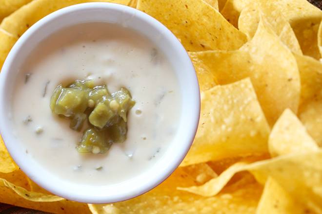 Order Chips & Hatch Chile Queso food online from Savage Burrito store, Brookfield on bringmethat.com