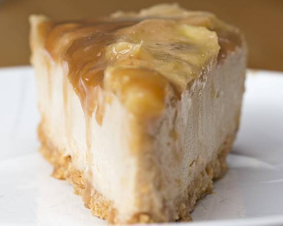 Order X-Large Reese's Peanut Butter Cheesecake Slice with Whip Cream food online from Valbella Midtown store, New York on bringmethat.com