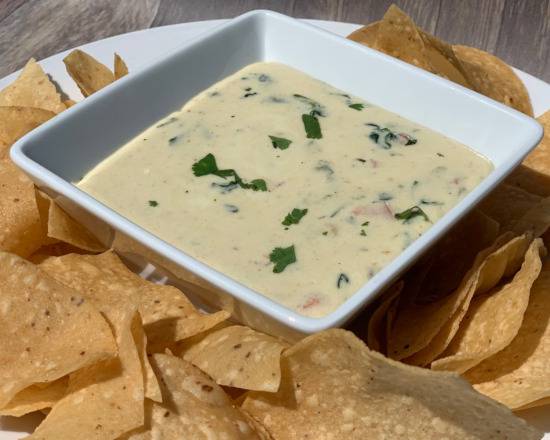 Order Queso Fundido Dip food online from Serranos Mexican Food store, Queen Creek on bringmethat.com