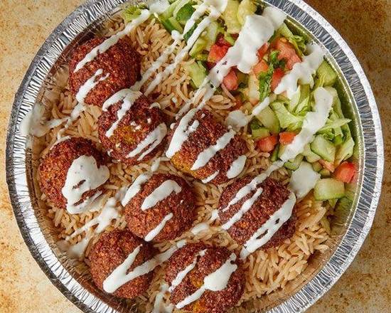 Order Falafel Over Rice food online from Yumze Food store, Far Rockaway on bringmethat.com
