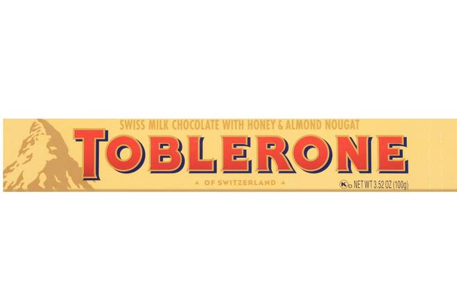 Order Swiss Milk Chocolate with Honey & Almond (Toblerone) food online from Turbo Merce store, Alpharetta on bringmethat.com