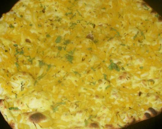 Order Onion Nan food online from Masala Dosa store, SF on bringmethat.com
