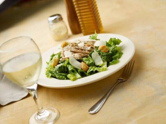 Order Chicken Caesar food online from Flippers Pizzeria store, Orlando on bringmethat.com