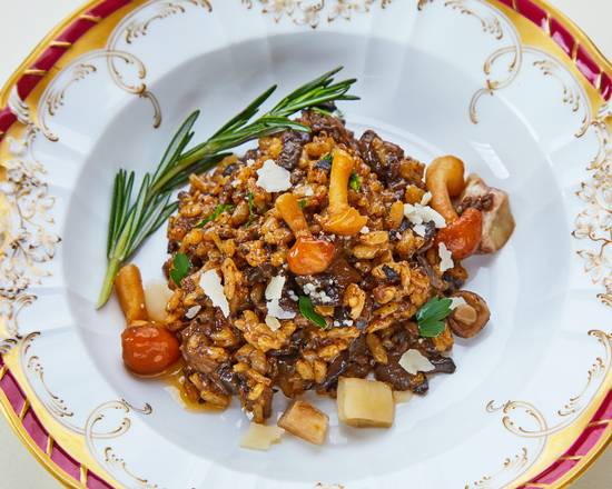 Order Risotto Porcini Mushrooms food online from Caffe Abbracci store, Miami on bringmethat.com
