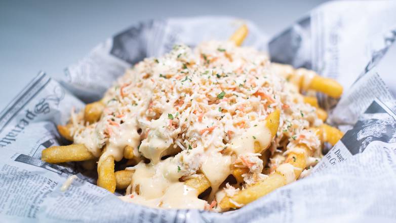 Order Crabmeat Fries food online from Hook & Reel Cajun Seafood store, Killeen on bringmethat.com
