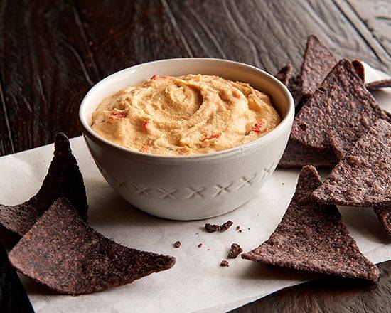 Order Blue Corn Chips & Red Pepper Hummus  food online from Jason Deli store, Decatur on bringmethat.com