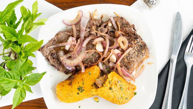 Order Tamal Con Bistec  food online from Geo's Cuban store, Seattle on bringmethat.com