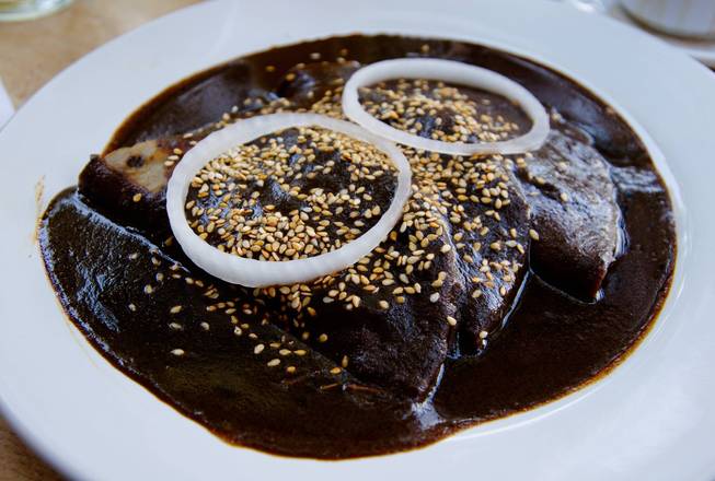 Order Plato de Mole food online from La Soledad Bakery store, Salinas on bringmethat.com