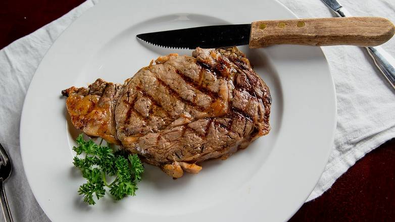 Order 14oz Boneless Ribeye food online from Hamilton Walkers store, Champaign on bringmethat.com
