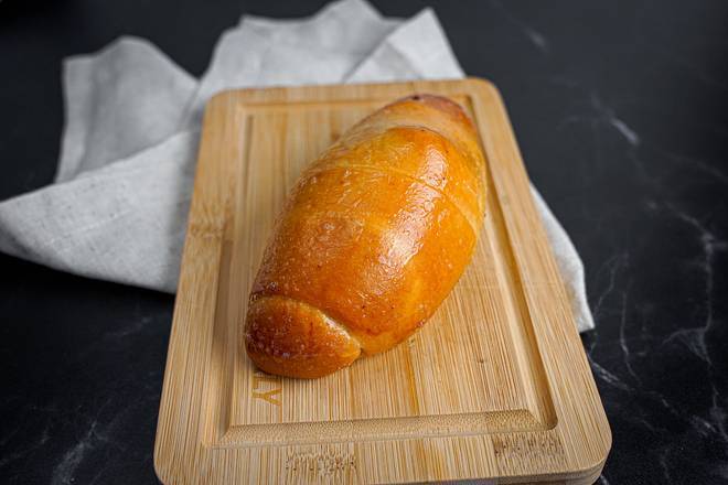 Order Cachito de jamón y queso food online from Sabor Venezolano Kendall store, Miami on bringmethat.com