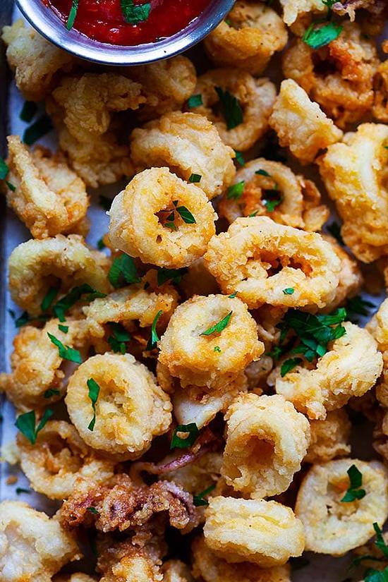 Order A06.Fried Squid (10 pcs) food online from Fuji Revolving Sushi Bar store, Cypress on bringmethat.com