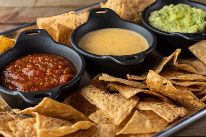 Order Trio Dips & Chips food online from Bar Louie store, Tustin on bringmethat.com