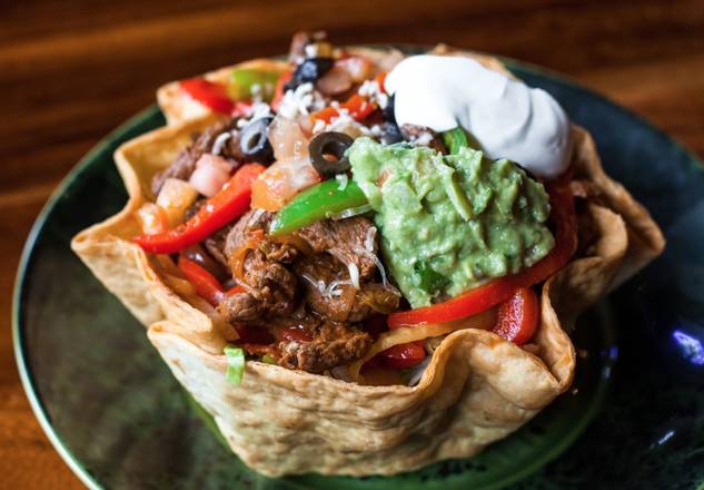 Order Deluxe Taco Salad food online from La Palmera store, seattle on bringmethat.com
