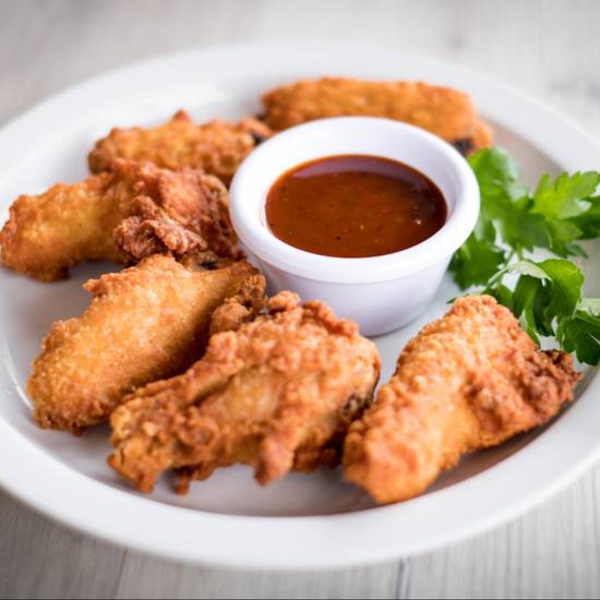 Order 10 Wings with 4 dipping sauces food online from The Great Room Cafe store, Redondo Beach on bringmethat.com