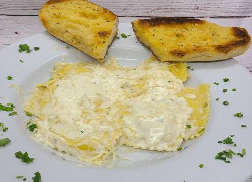 Order Stuffed Cheese Ravioli food online from Selma Chicago Pizzeria store, Rancho Santa Margarita on bringmethat.com