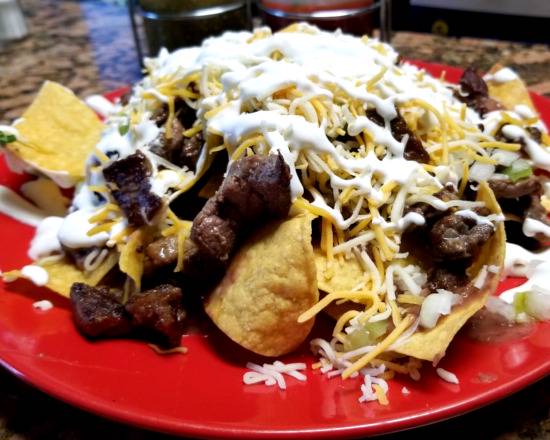 Order Nachos food online from Los Dos Amigos Taqueria 2 store, Miami Beach on bringmethat.com