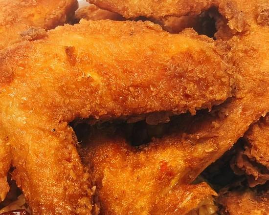 Order 20 WHOLE WINGS  food online from Krispy Krunchy Chicken store, Minneapolis on bringmethat.com