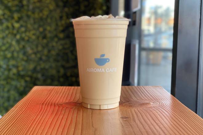 Order Oolong Milk Tea food online from Airoma Cafe store, Garden Grove on bringmethat.com