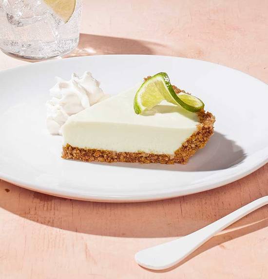 Order KEY LIME PIE food online from California Pizza Kitchen store, Plano on bringmethat.com