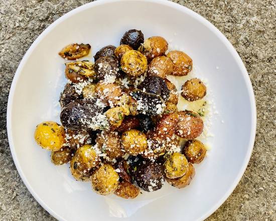 Order Aged Parmesan Truffle Fingerling Potatoes food online from Toscana By Fabio Viviani store, Arlington Heights on bringmethat.com