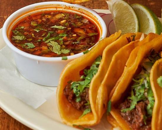 Order Birria Taco w. Consome (order of 3) food online from Homemade Taqueria store, New York on bringmethat.com