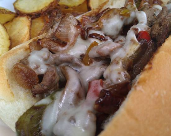 Order Cheesesteak Sub and Fries food online from Spot Eatz store, Orlando on bringmethat.com